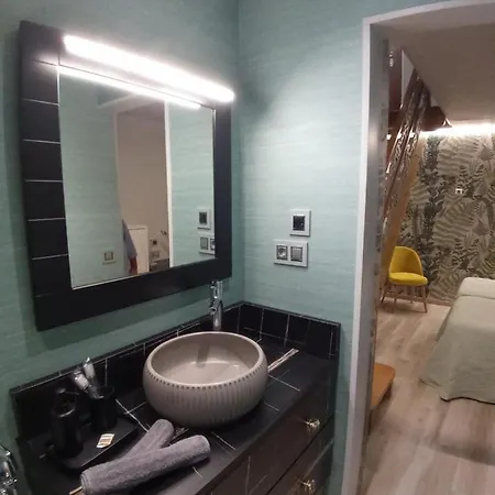 Les Casetes De San Lorenzo Апартаменты Хихон